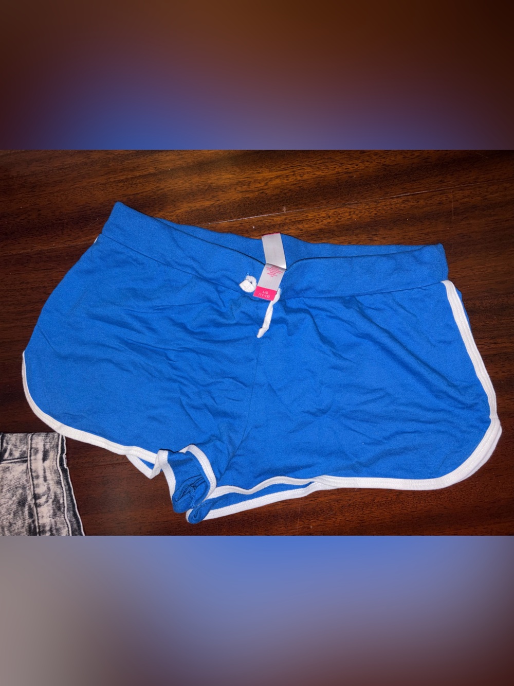 Blue Athletic Shorts with White Trim